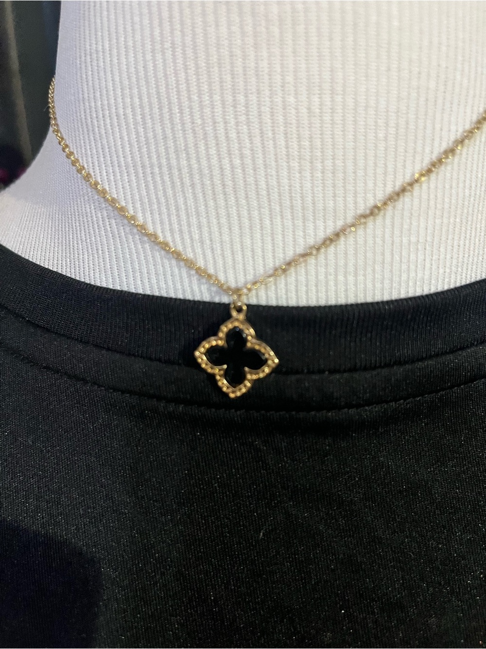 Gold-Tone Clover Pendant Necklace with Black Inlay